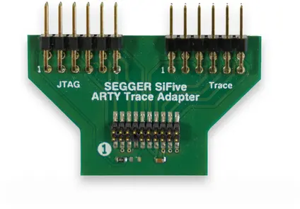 SEGGER SiFive-Arty Trace Adapter Image of a green printed circuit board (PCB) labeled "SEGGER SiFive ARTY Trace Adapter." The board features multiple pin headers, with the labels "JTAG" and "Trace" positioned near the top. The design includes clear traces and solder connections typical for electronic components.